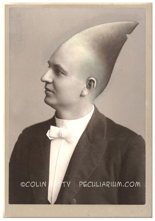 Illustration for article titled Artist Paints On Old Photographs And Turns Victorians Into Monsters